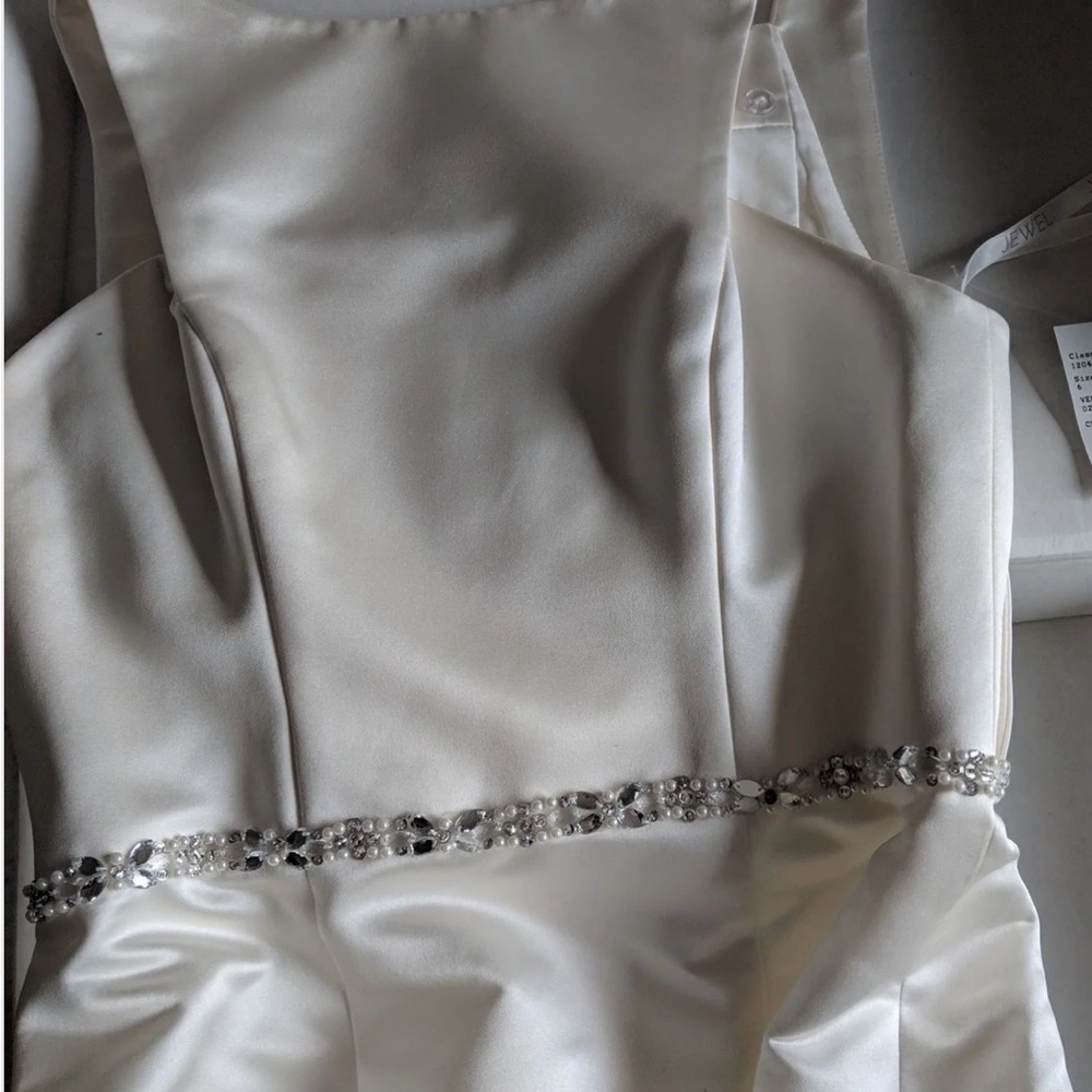 David's Bridal Elegant Cream Cape Wedding Dress